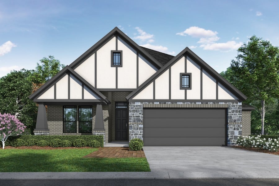 New suburban house with mixed siding and a two-car garage.